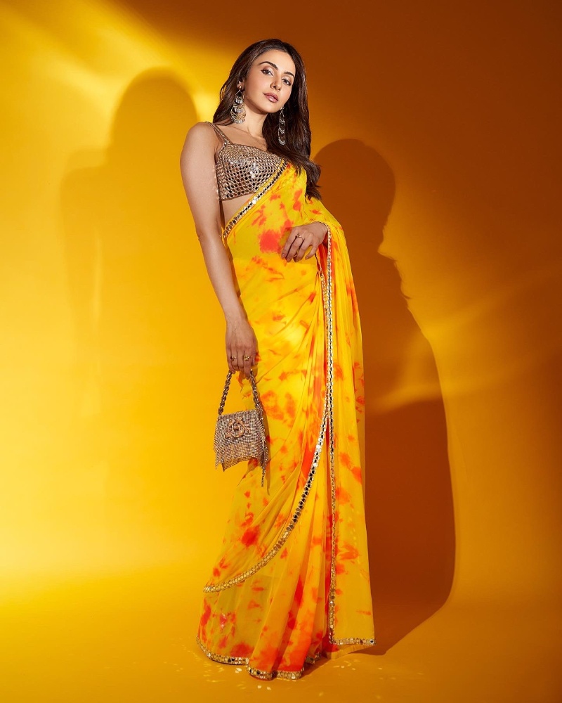 Stunning Rakul Preet Singh in yellow saree.