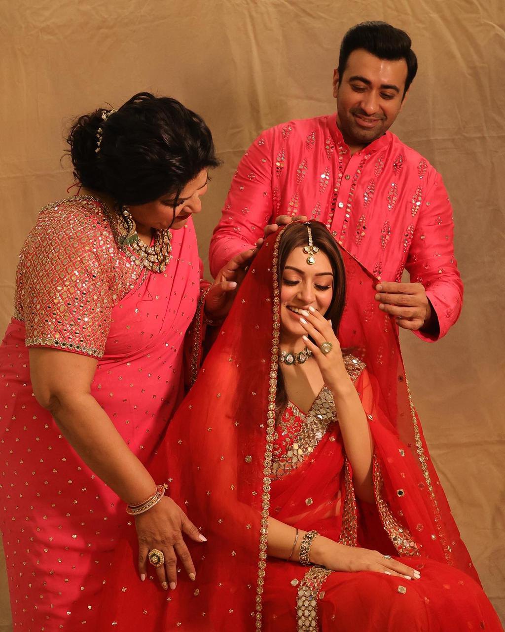 Hansika with her mother and brother